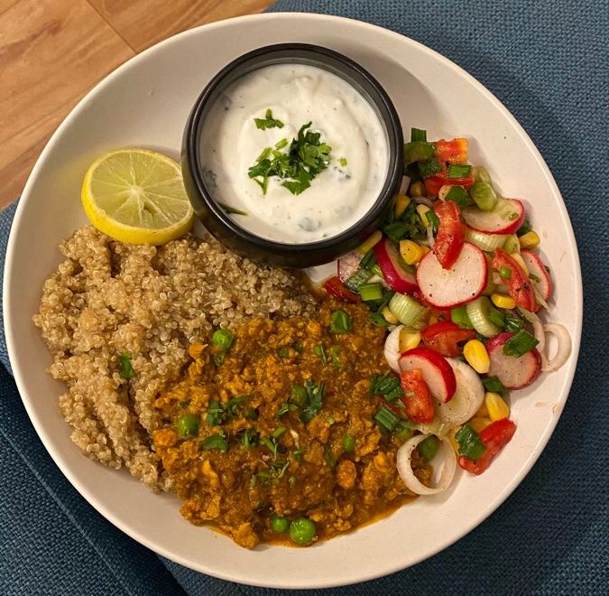 Indian millet meal plate with tofu bhurji, fresh salad, and plant-based curd served in small portions—ideal for portion control and diabetes-friendly eating.